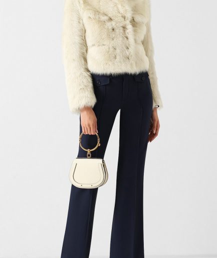 Укороченная шуба с кожаной отделкой